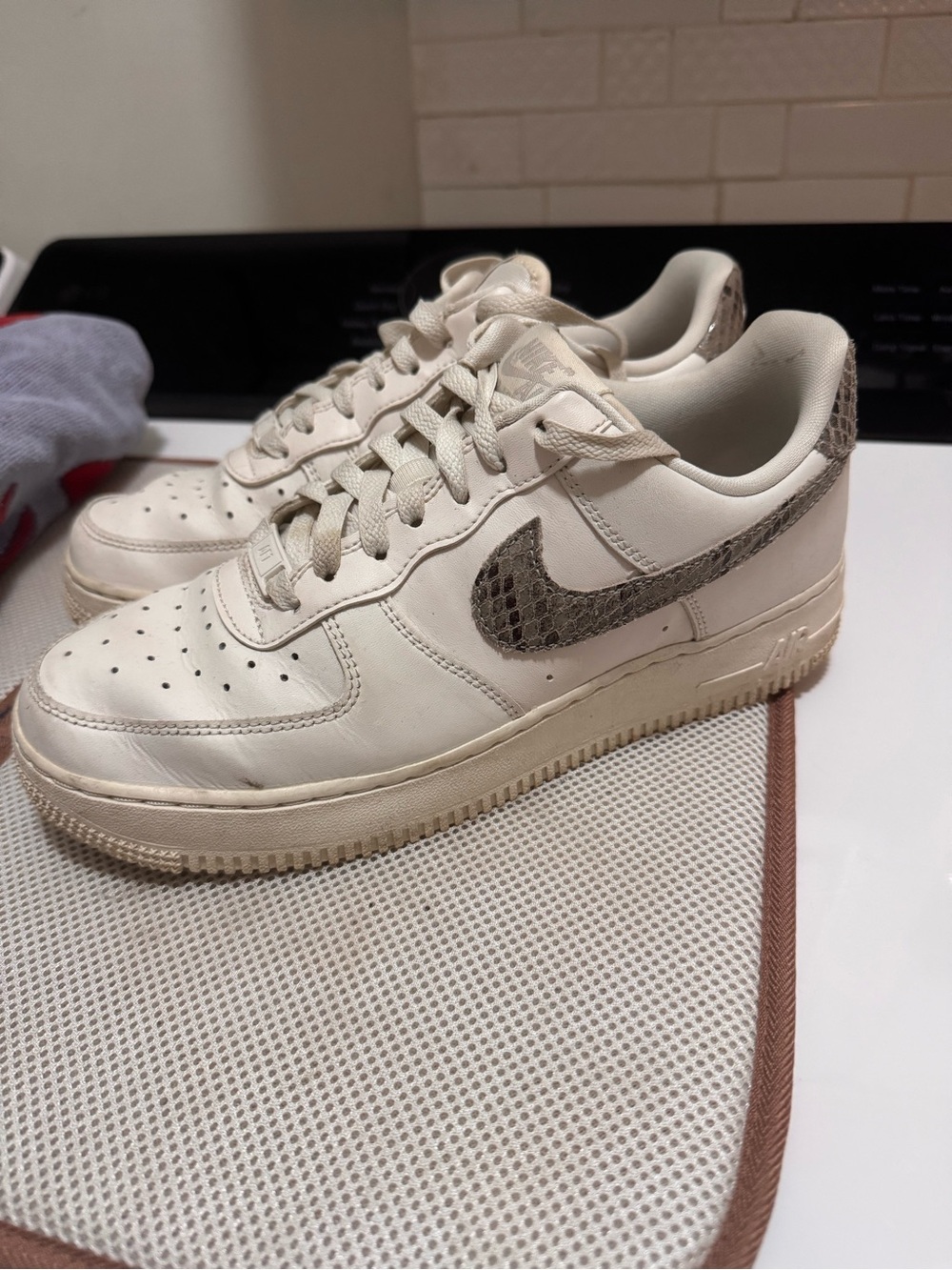 Nike Women’s 8.5 Low AirForce 1 Leather in Off-White with Snake-Print Swoosh